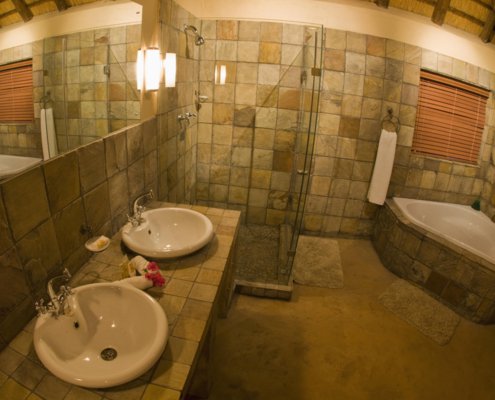 wetu rondavel bathroom1 Elephant Plains Game Lodge