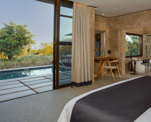 amber_villa_main_bedroom_view Sabi Sabi Earth Lodge